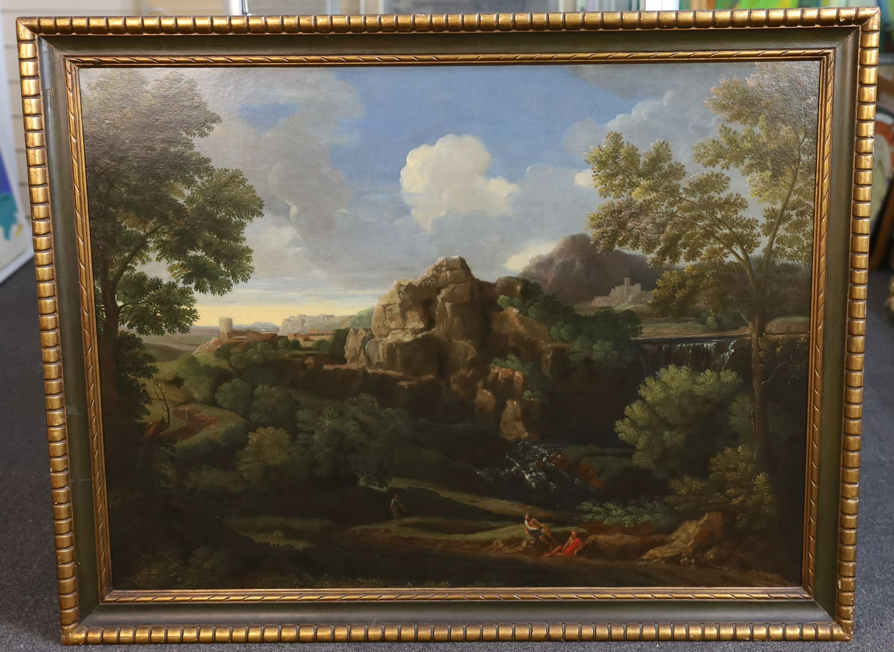 Circle of Nicolas Poussin (French, 1594-1665), Figures in an Italianate landscape, oil on canvas, 72 x 96cm